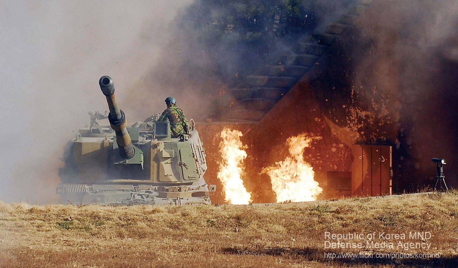 North Korean advanced exploding drone demonstration with Kim Jong Un overseeing.