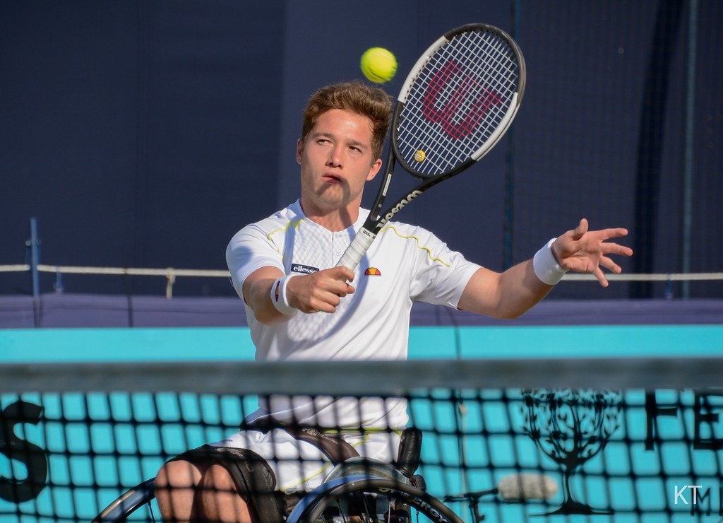 Alfie Hewett, a top wheelchair tennis player, in action on the court.